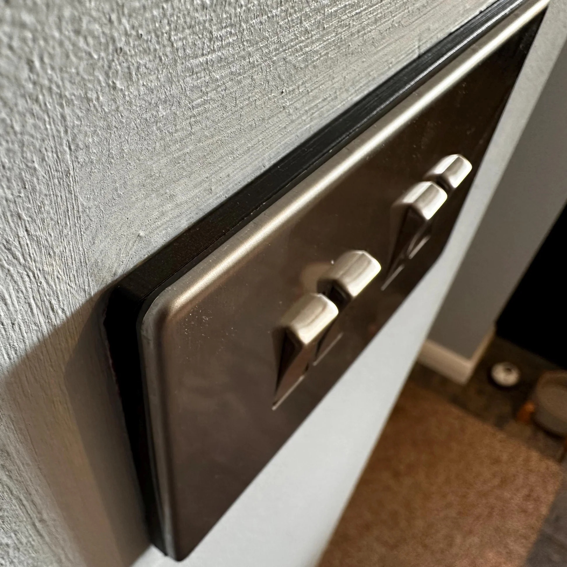 light switch with spacer